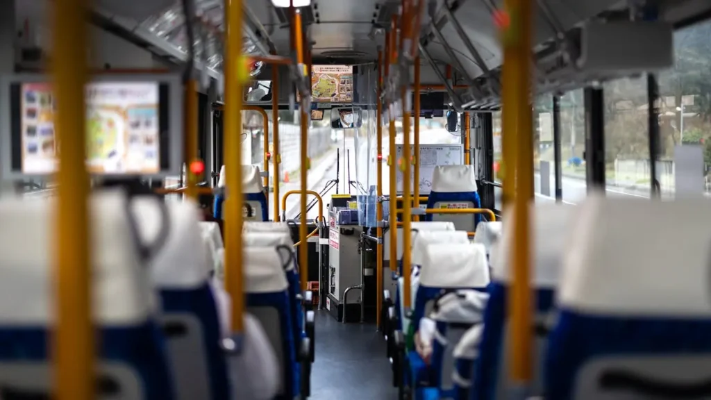 Empty Bus Interior in Japan with Bright Seats